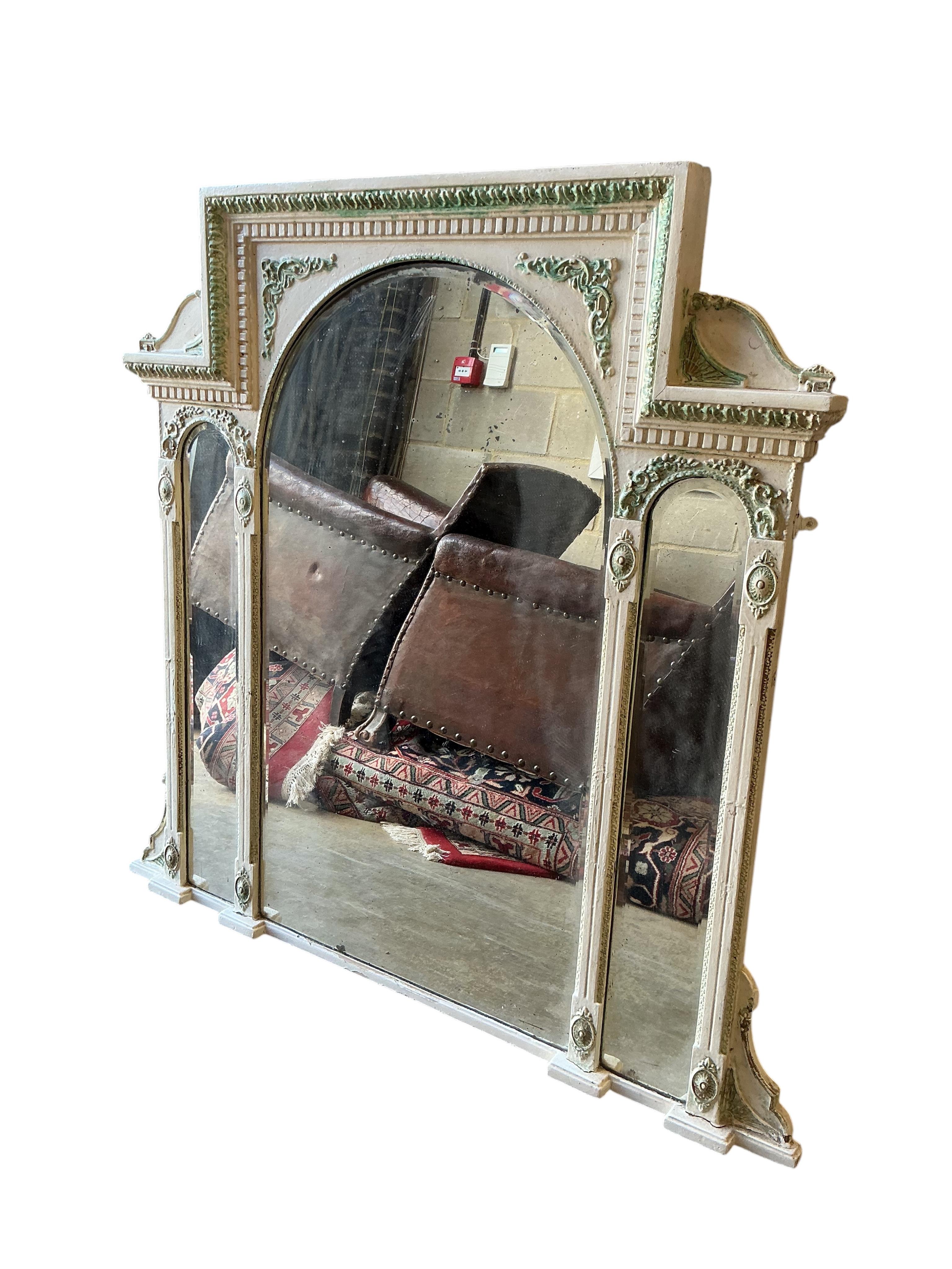 A Victorian overmantel mirror, later painted, width 116cm, height 123cm.